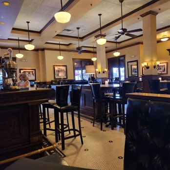 Maggiano's Little Italy - The bar area for dining. There is another dining area, an upstairs and a back banquet area. - Italian Near Me - Boca Raton, Florida Maggiano's Little Italy - The bar area for dining. There is another dining area, an upstairs and a back banquet area. - Italian Near Me - Boca Raton, Florida