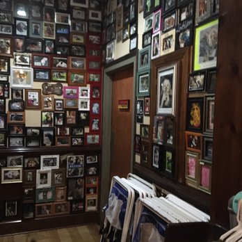 Dead Dog Saloon - Wall memorial of framed dog photos - Seafood Near Me - Murrells Inlet, South Carolina