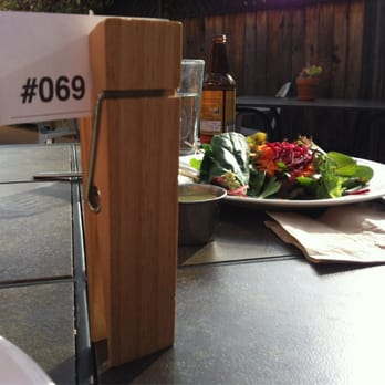 Hip Vegan - Quirky number flag and the outdoor dining area. (inside dining room also available) - Vegan Near Me - Ojai, California