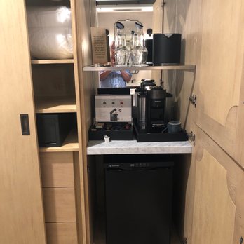 The Advenire - Fridge, bar and espresso as well as microwave and room safes are nicely stored inside a portion on the clothing cabinet/ amour - Hotels Near Me - St. George, Utah The Advenire - Fridge, bar and espresso as well as microwave and room safes are nicely stored inside a portion on the clothing cabinet/ amour - Hotels Near Me - St. George, Utah