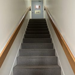 Dahy on King - Stairs leading up to the 2nd floor massage parlor