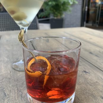 ZIBO! - a cocktail and a martini on a table - Pizza Near Me - Montreal, Quebec