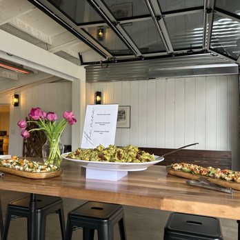 Fuller-Nutrifuel - a long table with food on it - Food Delivery Services Near Me Fuller-Nutrifuel - a long table with food on it - Food Delivery Services Near Me