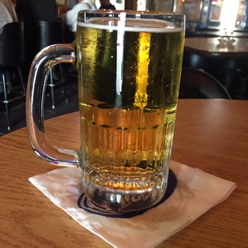Century Club - a glass of beer on a napkin - Dive Bars Near Me - Buffalo, Wyoming Century Club - a glass of beer on a napkin - Dive Bars Near Me - Buffalo, Wyoming