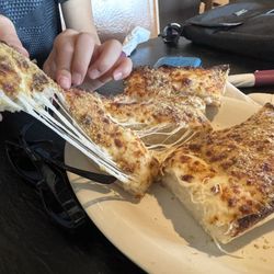 Pizza Hut - Cheese breadsticks w a side of marinara.