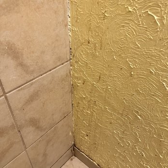 Don Ramon - Splatter stains on the wall and baseboard. - Mexican Near Me - Mayville, Wisconsin