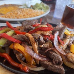 La Fountain Mexican Restaurant - Chicken and Steak Fajitas (with rice, beans, pico de gallo, guacamole and sour cream)