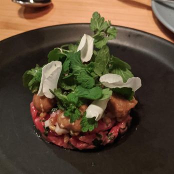Emmer & Rye - The beef tartare had I believe toasted wheat berries in it for that crunch-- more interesting than the frequent short cut of raw onion! - Tapas/Small Plates Near Me - Austin, Texas
