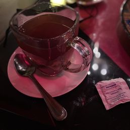 a cup of tea on a saucer a cup of tea on a saucer