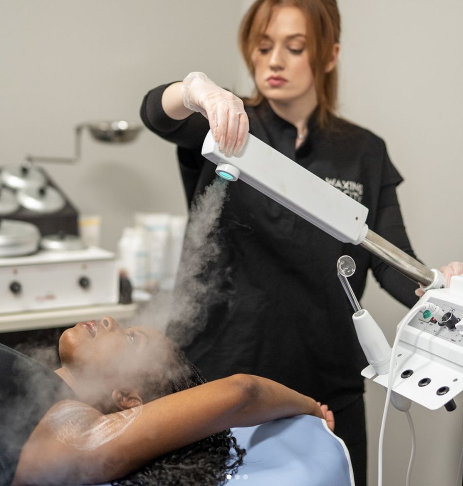 Waxing the City- Hermitage Logo