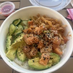 Build your own bowl: white rice, salmon, avocado, cucumber, wanton strips, spicy crab, spicy mayo, teriyaki sauce and sesame seeds. SO YUM!