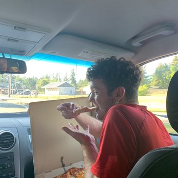 Rico's Pizza - Tommy enjoying his pizza as well - Pizza Near Me - Gold Bar, Washington Rico's Pizza - Tommy enjoying his pizza as well - Pizza Near Me - Gold Bar, Washington