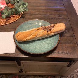 a plate with a sandwich on it a plate with a sandwich on it