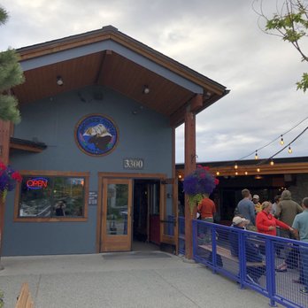 Moose's Tooth - Front with the beer garden to the right, for all the people waiting for their tables. - Pizza Near Me - Anchorage, Alaska Moose's Tooth - Front with the beer garden to the right, for all the people waiting for their tables. - Pizza Near Me - Anchorage, Alaska