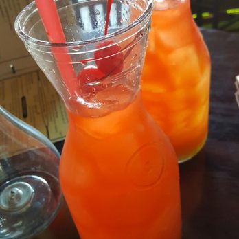Saddle Ranch - Bull Fighter - souther whiskey, sloe gin, melon liquor and pineapple juice - Steakhouses Near Me - Orange, California Saddle Ranch - Bull Fighter - souther whiskey, sloe gin, melon liquor and pineapple juice - Steakhouses Near Me - Orange, California