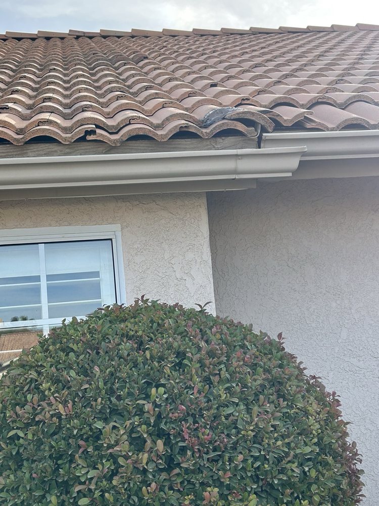 Slide of Holliday Roofing