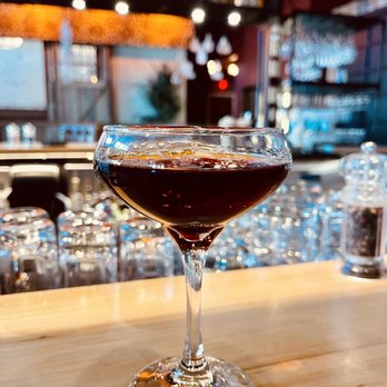 Donovan's Meatery - Black Manhattan cocktail. Rye whiskey, Averna Amaro, dash of Angostura bitters and orange bitters. Garnished with a Brandied cherry. - Steakhouses Near Me - Riverview, Florida Donovan's Meatery - Black Manhattan cocktail. Rye whiskey, Averna Amaro, dash of Angostura bitters and orange bitters. Garnished with a Brandied cherry. - Steakhouses Near Me - Riverview, Florida