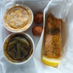 Caplinger's Fresh Catch Seafood Kitchen - Baked salmon, macncheese green beans and huspupies