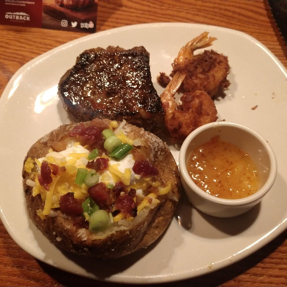 Outback Steakhouse - Sample of Steak,Coconut shrimp, and loaded baked potato. Shrimp was on point. - Steakhouses Near Me - West Manchester, Pennsylvania Outback Steakhouse - Sample of Steak,Coconut shrimp, and loaded baked potato. Shrimp was on point. - Steakhouses Near Me - West Manchester, Pennsylvania