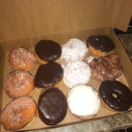a dozen donuts in a box