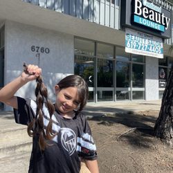 Continued Beauty - Cut off hair for Santiago's 1st wigs for kids donation. He was very happy to know that his hair could make another child happy