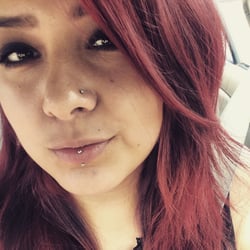Michael Jays Tattoo & Piercing Clinic - Vertical Labret done by Ashley. Very happy!