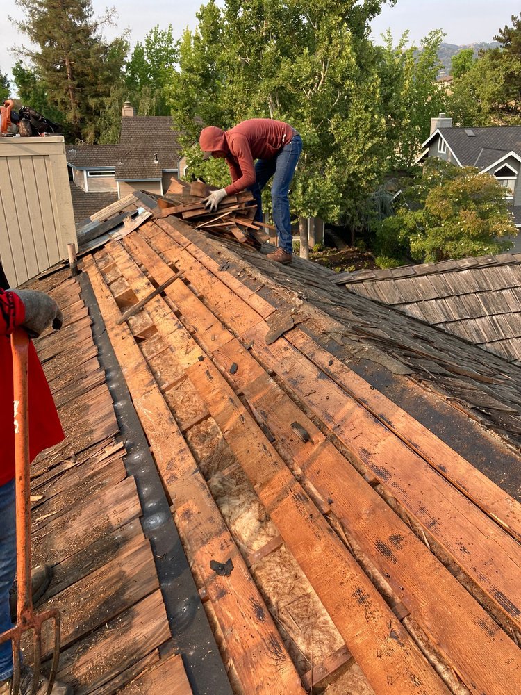 Slide of Green Group Roofing