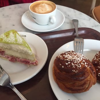 Vete-Katten - Original Cinnamon bun called kanelbullar with princess cake and a cappuccino - Bakeries Near Me - Stockholm, Alberta Vete-Katten - Original Cinnamon bun called kanelbullar with princess cake and a cappuccino - Bakeries Near Me - Stockholm, Alberta