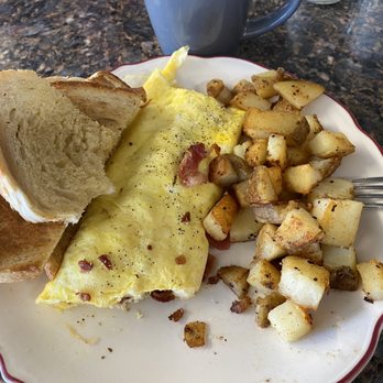 Two Loons Cafe - Bacon cheddar omelette with home fries and sourdough toast. (Supposedly) - Breakfast & Brunch Near Me - Wakefield, New Hampshire