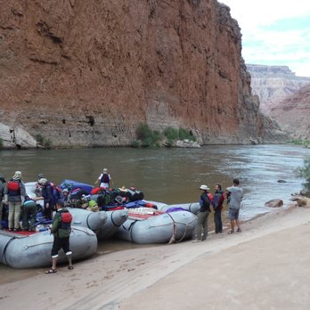 Grand Canyon Expeditions - Loading up the boats in the morning shade. - Rafting/Kayaking Near Me