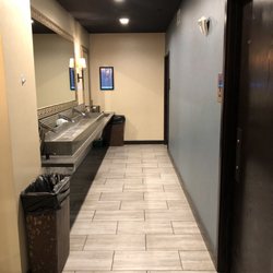 The Pourhouse Uptown - Bathrooms with a shared washing area. A great way for people to meet... or to find out who's really nasty and doesn't wash their hands...