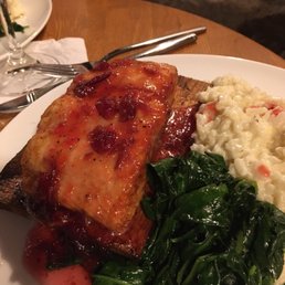 Salmon with cranberries, wilted spinach and Parmesan risotto Salmon with cranberries, wilted spinach and Parmesan risotto