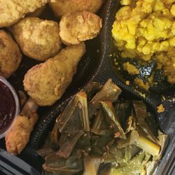 Fried shrimp, chicken drumsticks, Mac n cheese, collard greens