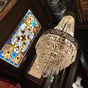 Orso's - a chandelier and a stained glass window - Italian Near Me - Chicago, Illinois Orso's - a chandelier and a stained glass window - Italian Near Me - Chicago, Illinois