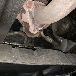 One of the bolts missing. This is the bottom of the catalytic converter attached to the exhaust. Those boys were really bad too! One of the bolts missing. This is the bottom of the catalytic converter attached to the exhaust. Those boys were really bad too!