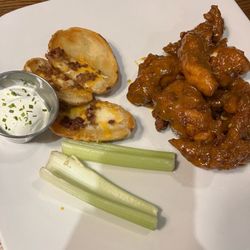 99 Restaurants - This is the poor excuse for the wings and skins platter What a joke!  The place has gone to hell