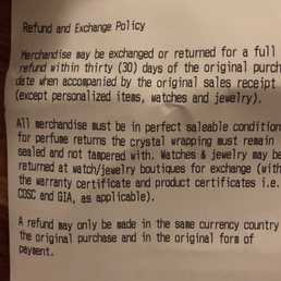 A copy of the return policy. No where does it say it won't issue refunds for "used" but mint condition bag.