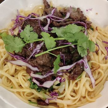 Saigon District - Garlic noods w sliced beef - Vietnamese Near Me - Huntington Beach, California Saigon District - Garlic noods w sliced beef - Vietnamese Near Me - Huntington Beach, California