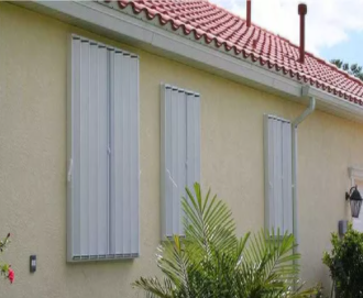 Accordion Shutters - Wind code approved and Miami Dade rated hurricane protection. Most popular Style for value for money Easy opening and closing great for the aging community. Excellent for windows, sliding glass doors, patios, balconies, and more Durable powder coated aluminum construction Can double as security shutters to protect your home or business while you’re away. Meets Class A insurance requirements for lowered premiums Custom manufactured for an exact fit. Available in white, ivory, beige, or bronze. The average cost for a whole house is between $5,000 - $10,000. Accordion Shutters - Wind code approved and Miami Dade rated hurricane protection. Most popular Style for value for money Easy opening and closing great for the aging community. Excellent for windows, sliding glass doors, patios, balconies, and more Durable powder coated aluminum construction Can double as security shutters to protect your home or business while you’re away. Meets Class A insurance requirements for lowered premiums Custom manufactured for an exact fit. Available in white, ivory, beige, or bronze. The average cost for a whole house is between $5,000 - $10,000.