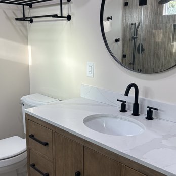 Bayside Home Improvement - Location of the toilet and the sink moved to opposite of the shower. - General Contractors Near Me Bayside Home Improvement - Location of the toilet and the sink moved to opposite of the shower. - General Contractors Near Me