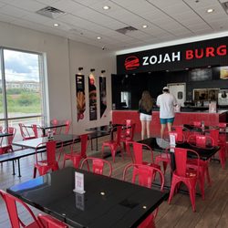 ZOJAH Burger - Another interior view towards register. Clean colorful & inviting atmosphere