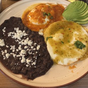 La Viuda Negra Cantina - huevos divorciados with refried black beans and a generous amount of avocado. yum!! - Cocktail Bars Near Me - Duluth, Georgia