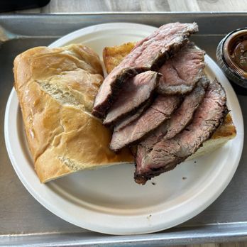 Busters Og Bbq & Grill - Tri Tip Sandwich with hot sauce - Barbeque Near Me - Thousand Oaks, California Busters Og Bbq & Grill - Tri Tip Sandwich with hot sauce - Barbeque Near Me - Thousand Oaks, California