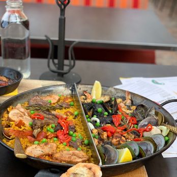 Cafe Sevilla - Meat Paella "Rupestre" and Black Seafood Paella Dividida - Spanish Near Me - Costa Mesa, California
