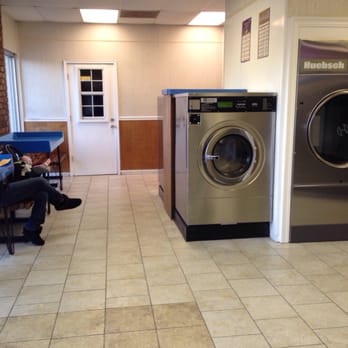 Mire's Washateria - The door to the assistant on duty.  She provides the quarters.  There is no coin machine. - Laundry Services Near Me - Westwego, Louisiana