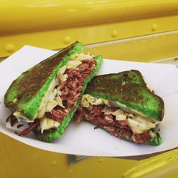 Which Cheese - St. Pattys day special. Seasoned and simmered corned beef n cabbage, scalloped potatoes, Dijon mustard, swiss cheese on green sourdough.