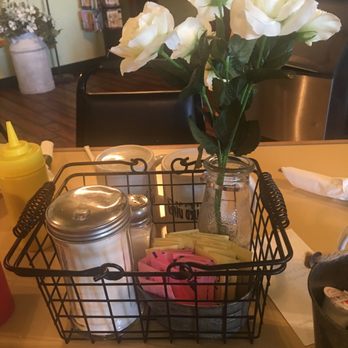 Frontier Diner - a basket of condiments and condiments - Diners Near Me - Cheraw, Colorado