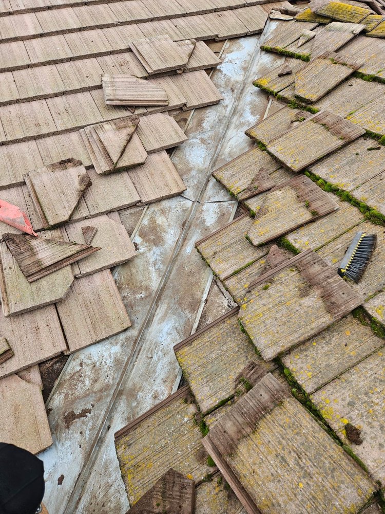 Slide of Action Roofing Service