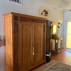 Bowen Treatment and Healing Center - Beautiful armoire in the waiting area.