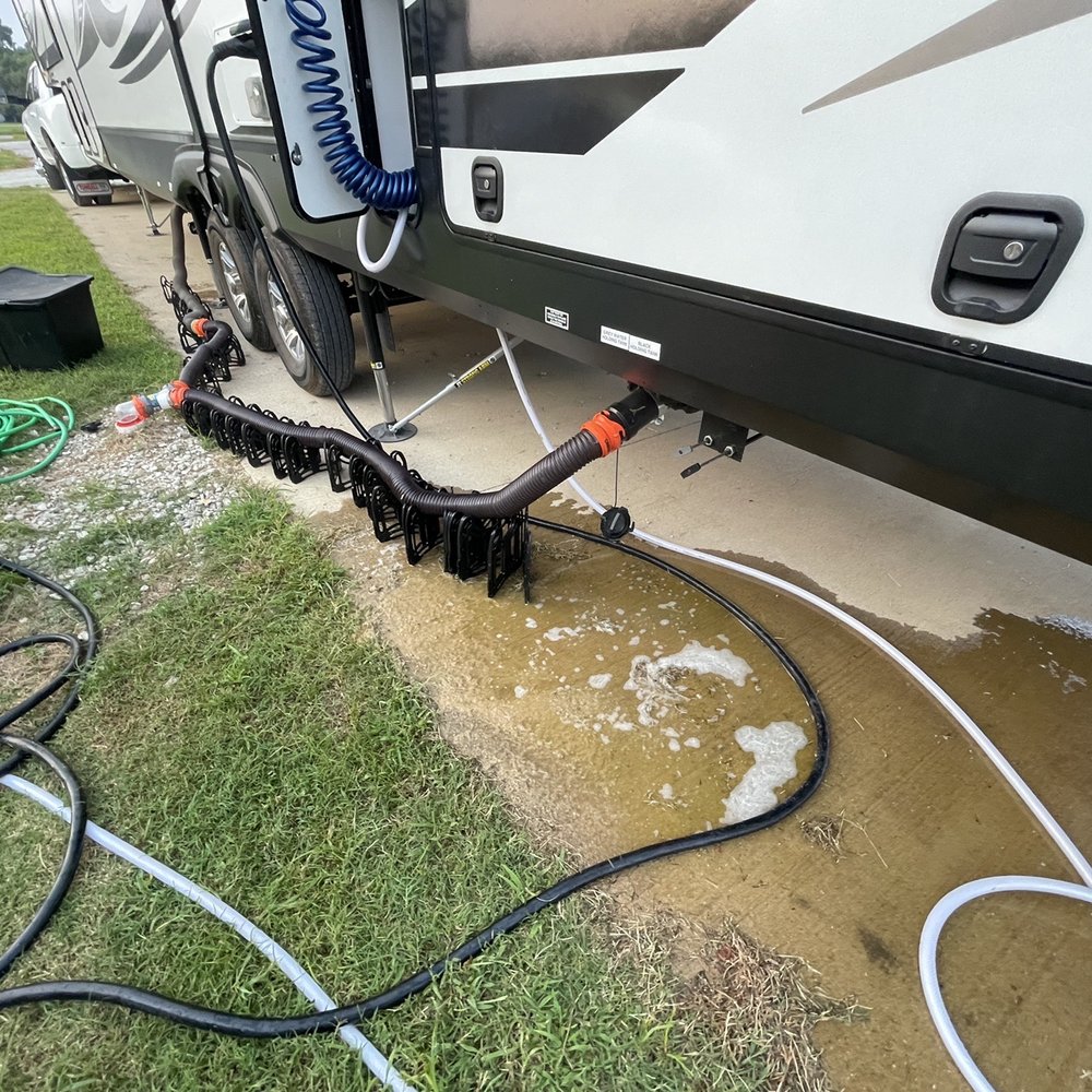 Blue Compass RV - Poo water trapped on black pipe from small leak in valve, probably loose handle getting knocked around while on the road. See next... - RV Dealers Near Me - Denton, Texas